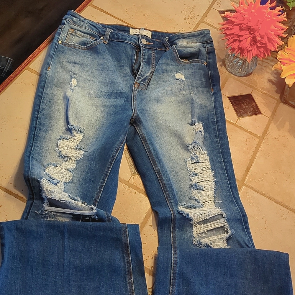 Risen distressed flare leg jeans size 15
